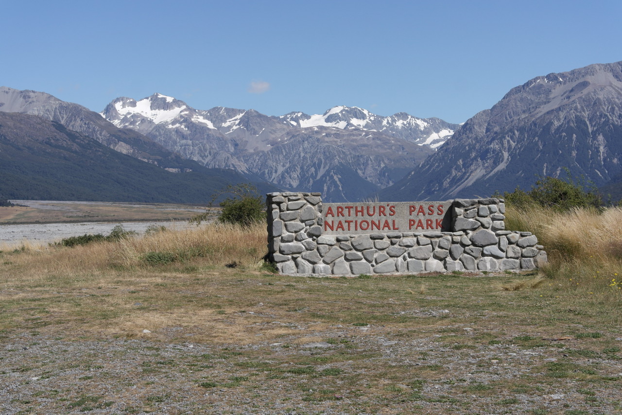 020 Coast To Coast Arthur's Pass National Park Sign With Mountains